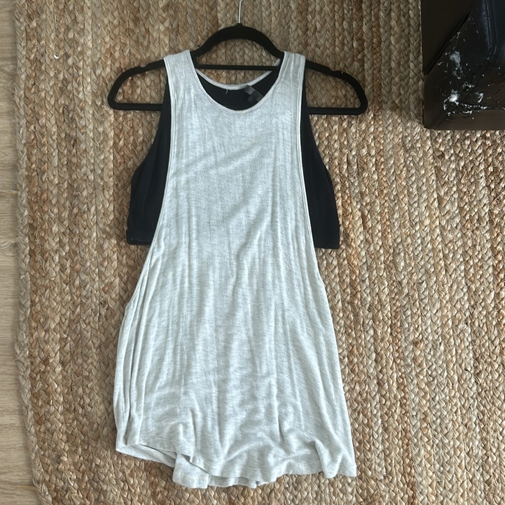 Flowy sleeveless top with deep open sides + built in crop underneath